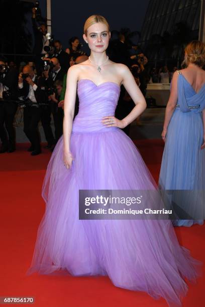 Elle Fanning departs the "The Beguiled" screening during the 70th annual Cannes Film Festival at Palais des Festivals on May 24, 2017 in Cannes,...