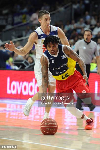 Andrew Albicy, #16 guard of Andorra and Jaycee Carroll, #20 guard of Real Madrid during the Liga Endesa Play off game between Real Madrid and Andorra...