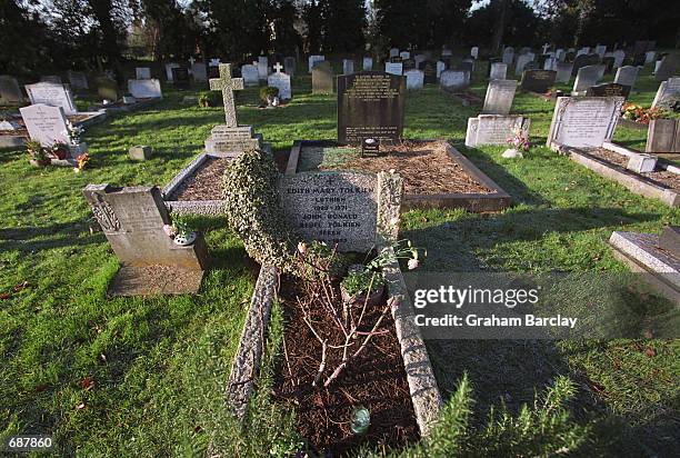 The grave of ''Lord of the Rings'' author J.R.R. Tolkien and his wife Edith December 15, 2001 at a cemetery in Oxford, England. The first movie of...