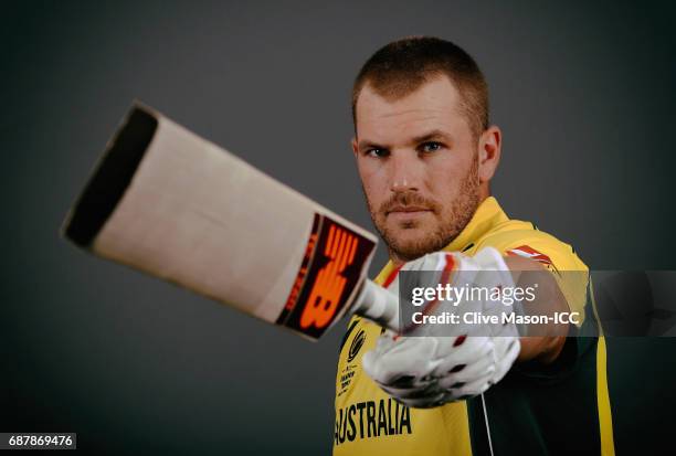 Aaron Finch of Australia poses during a portrait session ahead of the ICC Champions Trophy at the Royal Garden Hotel on May 24, 2017 in London,...