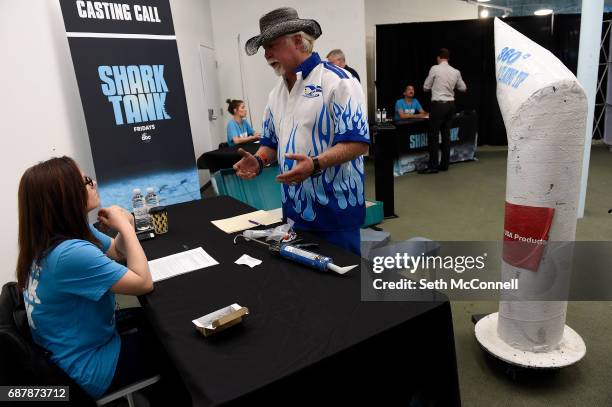 Christopher Cross pitches his product, 360 Pro Caulking Tip, to Casting Associate Jackie Kreterfield during open auditions for the television show...