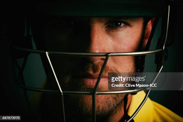 Aaron Finch of Australia poses during a portrait session ahead of the ICC Champions Trophy at the Royal Garden Hotel on May 24, 2017 in London,...