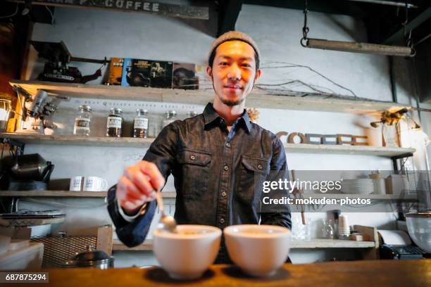 confident young male happy cafe owner - 医療とヘルスケア stock pictures, royalty-free photos & images