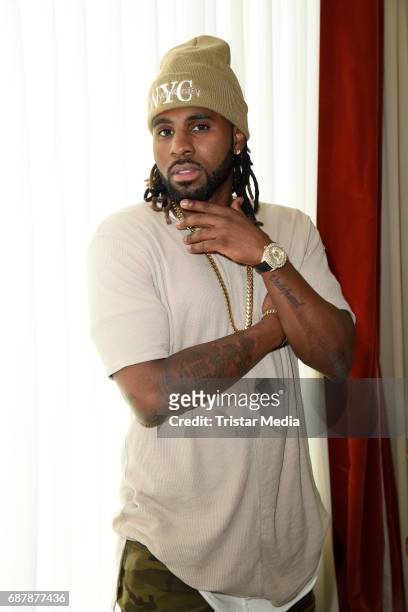 Singer Jason Derulo poses during a photo session to present his new record '777' at Waldorf Astoria on May 24, 2017 in Berlin, Germany.