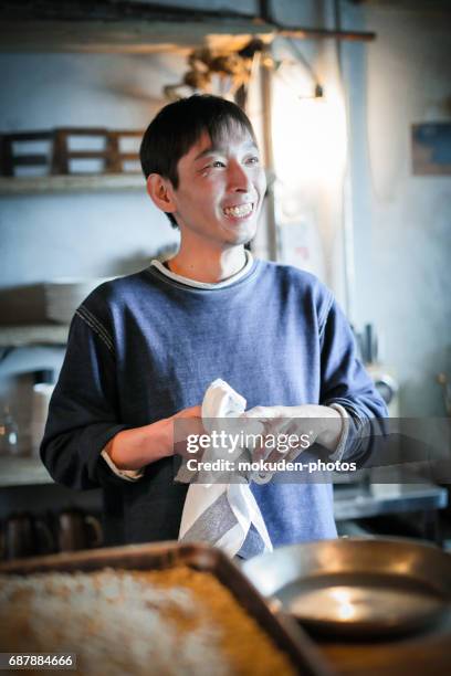 confident young male happy cafe owner - オーナー imagens e fotografias de stock