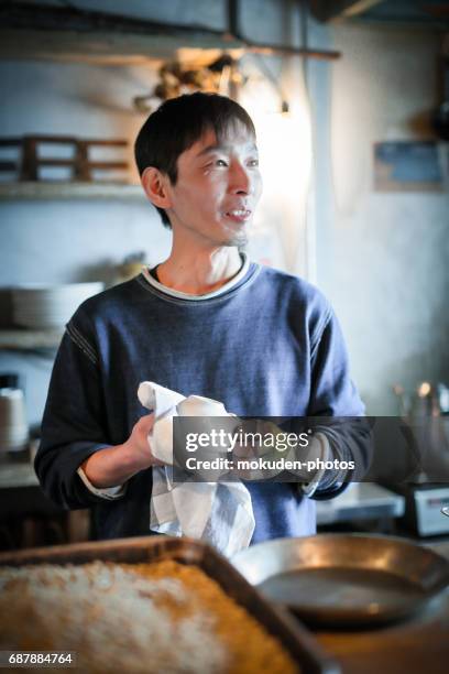 confident young male happy cafe owner - オーナー imagens e fotografias de stock