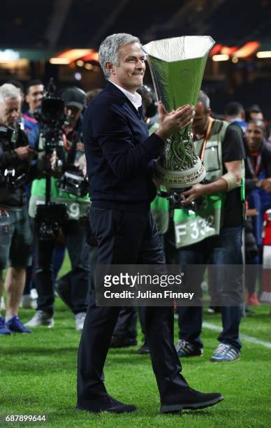 Jose Mourinho, Manager of Manchester United celebrates with The Europa League trophy after the UEFA Europa League Final between Ajax and Manchester...