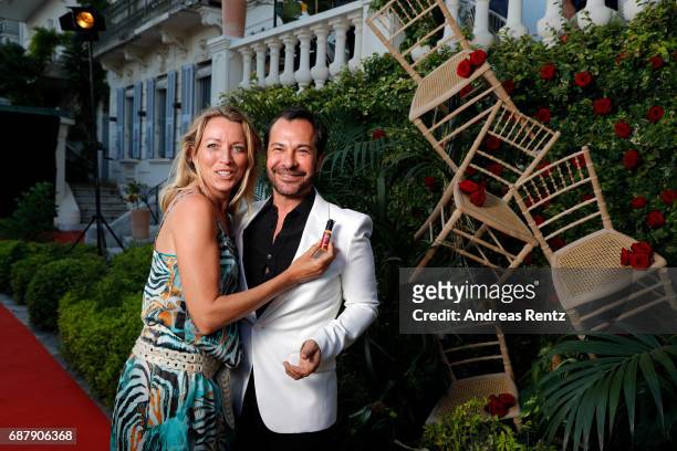 Sanny van Heteren and Ricardo Rojas attend the AMORE cocktail reception hosted by Ricardo Rojass and Jim Mannino on the Lemon Lemon Terrace during...