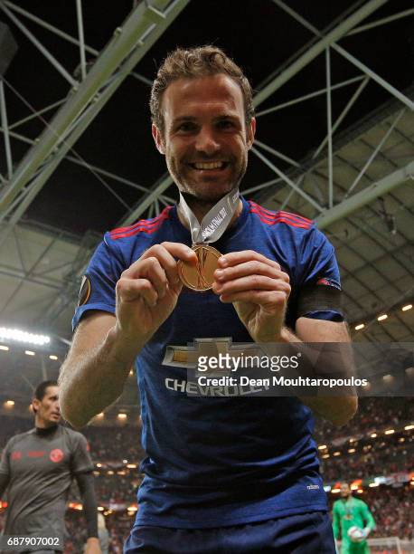 Juan Mata of Manchester United celebrates with his winners medal after the UEFA Europa League Final between Ajax and Manchester United at Friends...