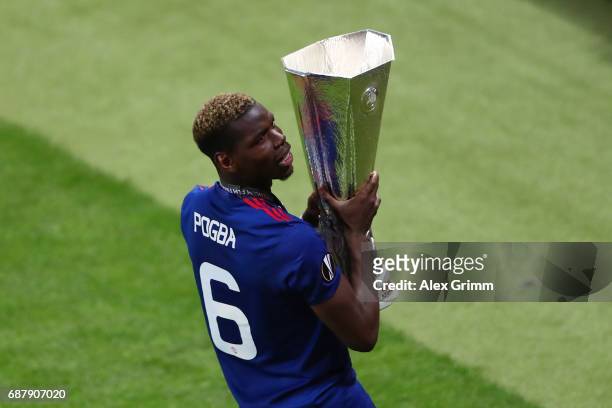 Paul Pogba of Manchester United celebrates with The Europa League trophy after the UEFA Europa League Final between Ajax and Manchester United at...