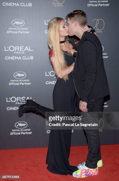 Paris Hilton and Chris Zylka attend the Gala 20th Birthday Of L'Oreal In Cannes during the 70th annual Cannes Film Festival at Martinez Hotel on May...