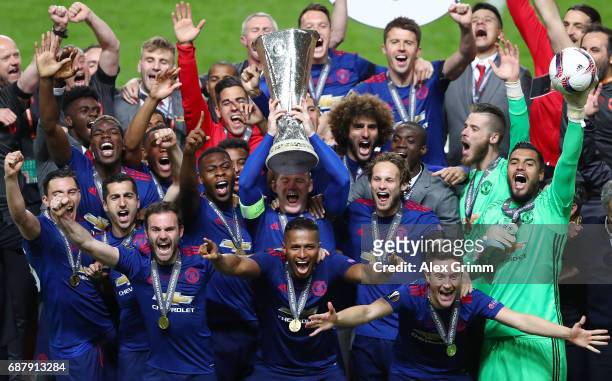 Wayne Rooney of Manchester United lifts The Europa League trophy after the UEFA Europa League Final between Ajax and Manchester United at Friends...