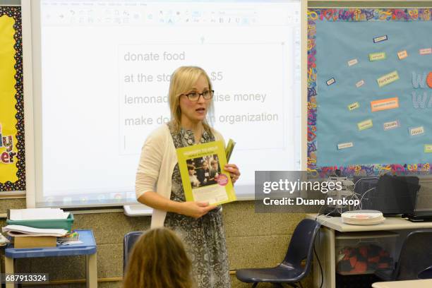 Second Grade Teacher Mary Alexander instructs her students at Saint Hillary School on the Hungry To Help Lesson Plan, hosted by Feeding America and...