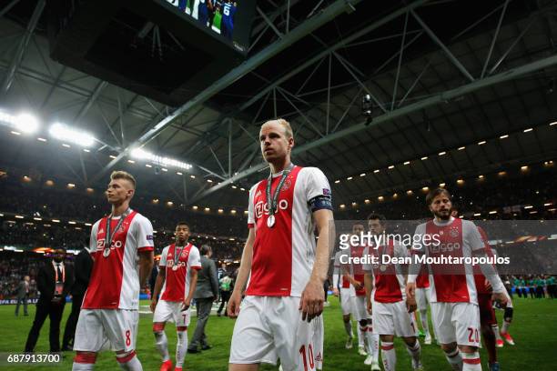 Ajax players look dejected following the UEFA Europa League Final between Ajax and Manchester United at Friends Arena on May 24, 2017 in Stockholm,...