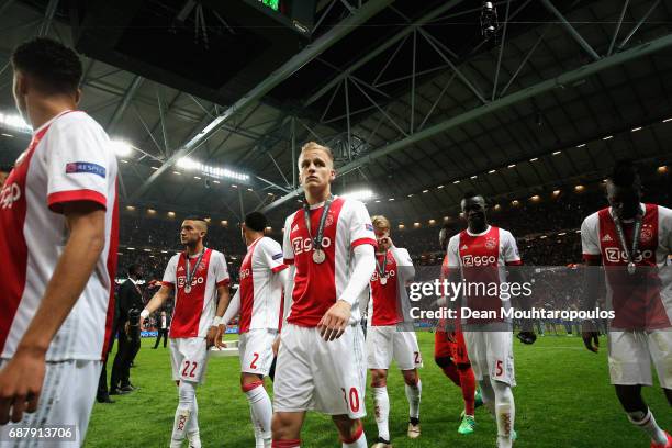 Ajax players look dejected following the UEFA Europa League Final between Ajax and Manchester United at Friends Arena on May 24, 2017 in Stockholm,...