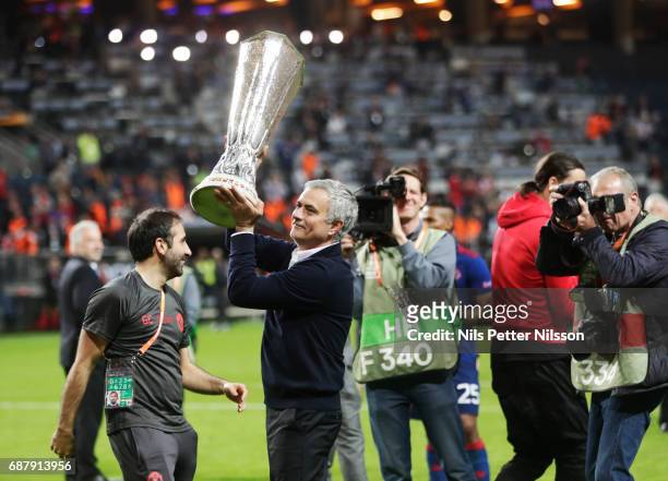 José Mourinho, head coach of Manchester United celebrates with the trophy after during the UEFA Europa League Final between Ajax and Manchester...