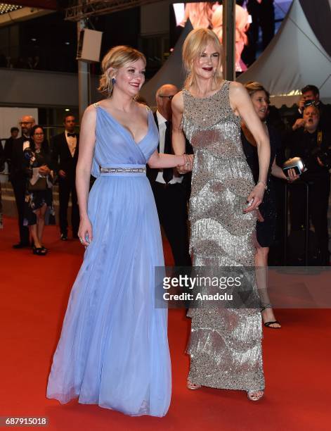 Australian actress Nicole Kidman and US actress Kirsten Dunst leave after the premiere of the film The Beguiled in competition at the 70th annual...