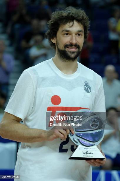 Sergio Llull guard of Real Madrid receives the best guard trophy of Liga Endesa during the Liga Endesa Play off game between Real Madrid and Andorra...