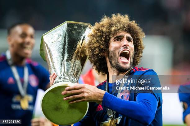 Marouane Fellaini of Manchester United celebrates with the Europa League trophy after the UEFA Europa League final between Ajax and Manchester United...