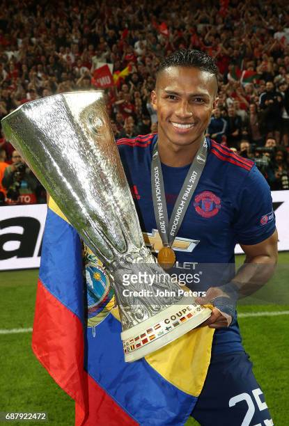 Antonio Valencia of Manchester United celebrates with the Europa League trophy after the UEFA Europa League Final match between Manchester United and...