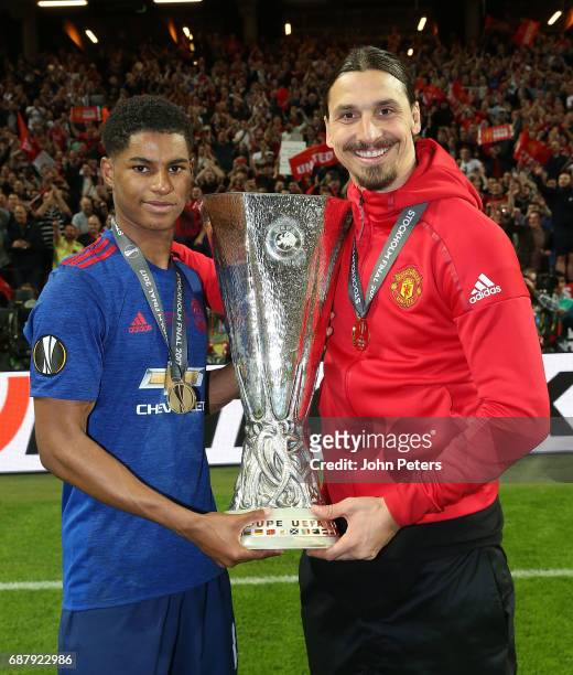 Marcus Rashford and Zlatan Ibrahimovic of Manchester United celebrate with the Europa League trophy after the UEFA Europa League Final match between...