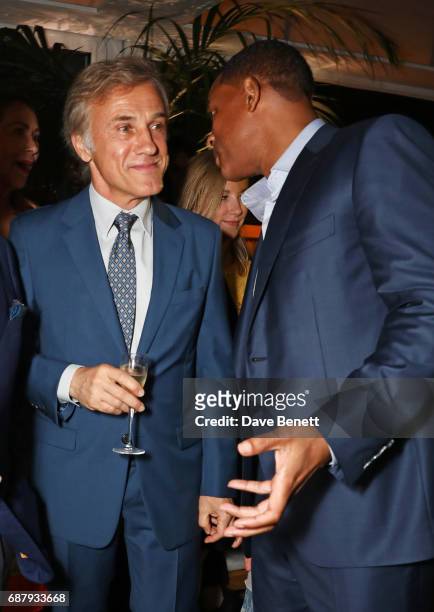 Christoph Waltz and Will Smith attend the Chopard and Annabel's Gentleman's Evening at the Hotel Martinez during the 70th Annual Cannes Film Festival...
