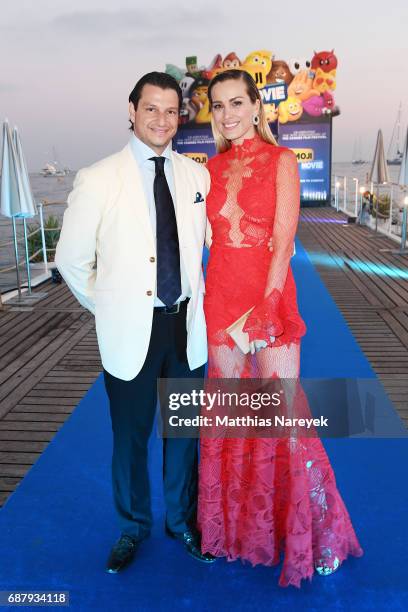 Alejandro Grimaldi and Petra Nemcova attend the Generous People 5th Anniversary Party during the 70th annual Cannes Film Festival at Martinez Pier on...