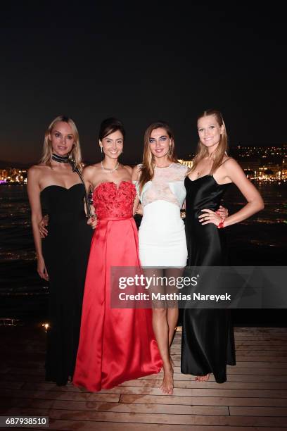 Inna Zobova, Patricia Contreras, Alina Baikova and Toni Garrn attend the Generous People 5th Anniversary Party during the 70th annual Cannes Film...