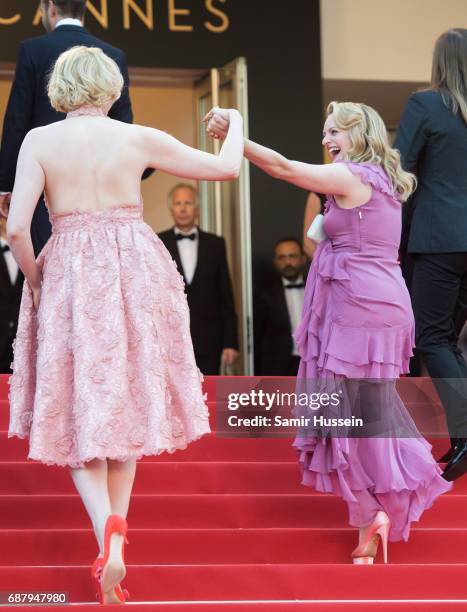 Elisabeth Moss and Gwendoline Christie attend the 70th Anniversary screening during the 70th annual Cannes Film Festival at Palais des Festivals on...