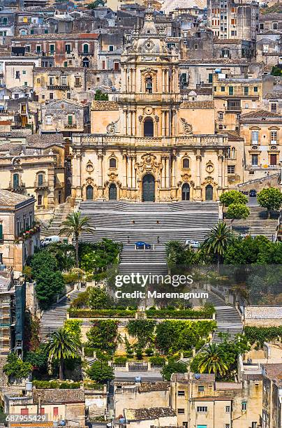 the duomo (cathedral) of san giorgio and the town - modica sicily stock pictures, royalty-free photos & images