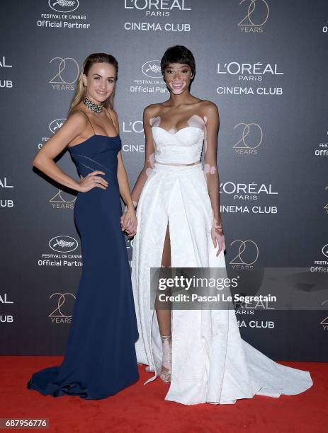 Carmen Jorda and Winnie Harlow attend the Gala 20th Birthday Of L'Oreal In Cannes during the 70th annual Cannes Film Festival at Martinez Hotel on...