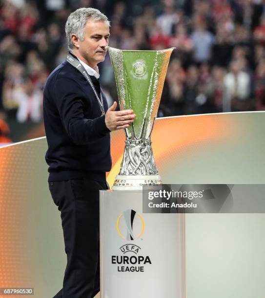 Coach Jose Mourinho of Manchester United celebrates with a trophy after the UEFA Europa League Final match between Ajax and Manchester United at...