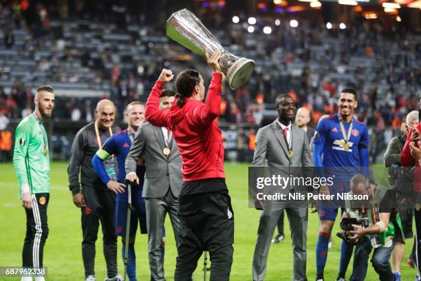 Zlatan Ibrahimovi of Manchester United with the trophy during the UEFA Europa League Final between Ajax and Manchester United at Friends Arena on May...