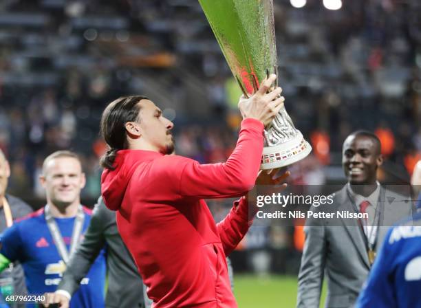 Zlatan Ibrahimovi of Manchester United with the trophy during the UEFA Europa League Final between Ajax and Manchester United at Friends Arena on May...