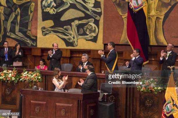 Lenin Moreno, Ecuador's president-elect, center left, reacts as former Ecuadorian president Rafael Correa, center right, and attendees applaud during...