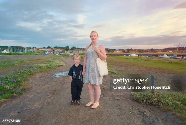 mother and son - single mother portrait stock pictures, royalty-free photos & images