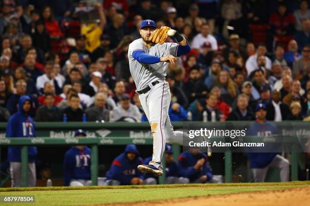Joey Gallo of the Teaxs Rangers throws to first base in the sixth inning of a game against the Boston Red Sox at Fenway Park on May 24, 2017 in...