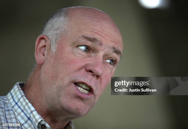 Republican congressional candidate Greg Gianforte looks on during a campaign meet and greet at Lions Park on May 23, 2017 in Great Falls, Montana....