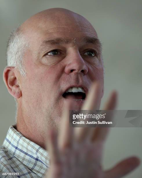 Republican congressional candidate Greg Gianforte looks on during a campaign meet and greet at Lions Park on May 23, 2017 in Great Falls, Montana....