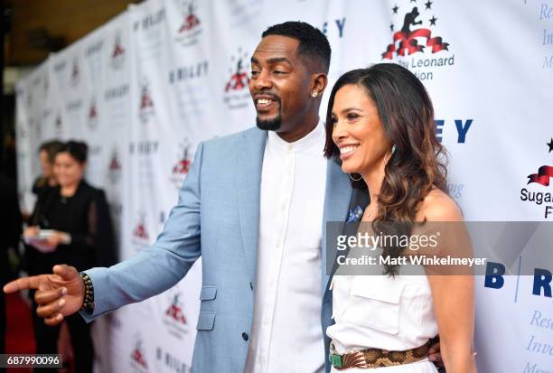 Actor Bill Bellamy and Kristen Baker Bellamy attend the B. Riley & Co. 8th Annual "Big Fighters, Big Cause" Charity Boxing Night benefiting the Sugar...