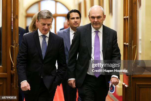 Prime Minister Bill English and Finance Minister Steven Joyce make their way to the house before the 2017 budget presentation at Parliament on May...