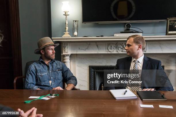 Singer Drake White with NAMM and CMA members speak with Sen. Luther Strange during "NAMM, VH1 And CMA Day Of Music Education Advocacy Capitol Hill"...