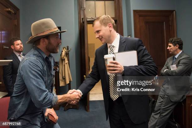 Singer Drake White with NAMM and CMA members speak with Sen. Luther Strange during "NAMM, VH1 And CMA Day Of Music Education Advocacy Capitol Hill"...