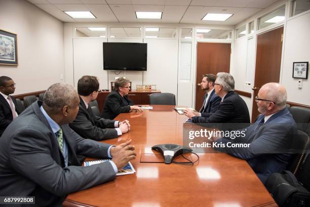 National Association of Music Merchants president Joe Lamond with Bernie Williams, Robin Walente and NAMM members prepare to speak with Sen. Charles...