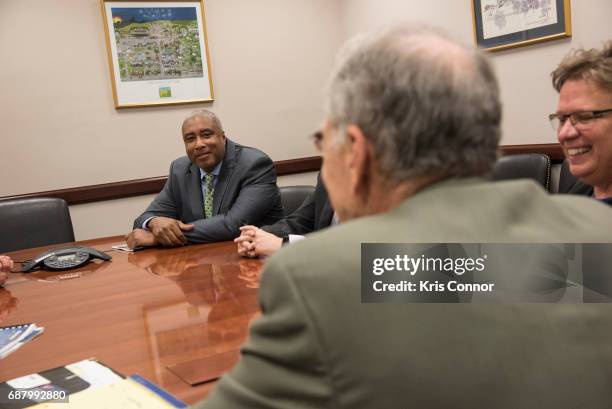 National Association of Music Merchants member Bernie Williams speaks with Sen. Charles Grassley during "NAMM, VH1 And CMA Day Of Music Education...