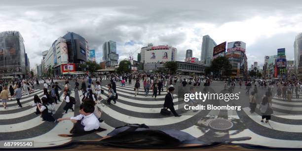 Image was created as an Equirectangular Panorama. Import image into a panoramic player to create an interactive 360 degree view.) Pedestrians cross a...