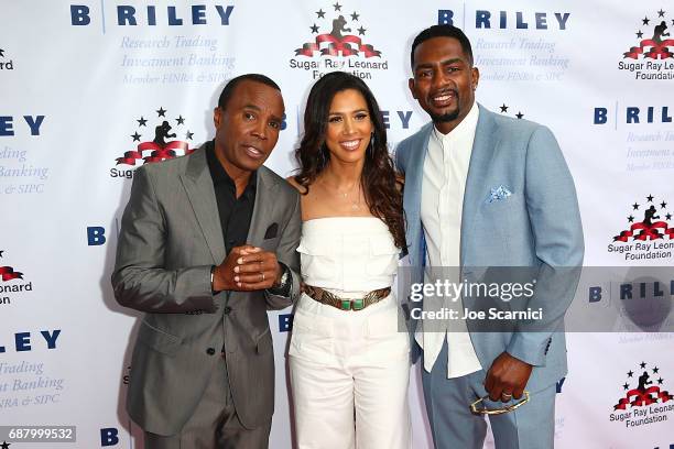 Sugar Ray Leonard, Kristen Baker Bellamy and Bill Bellamy attend the 8th Annual "Big Fighters, Big Cause" Charity Boxing Night at the Loews Santa...