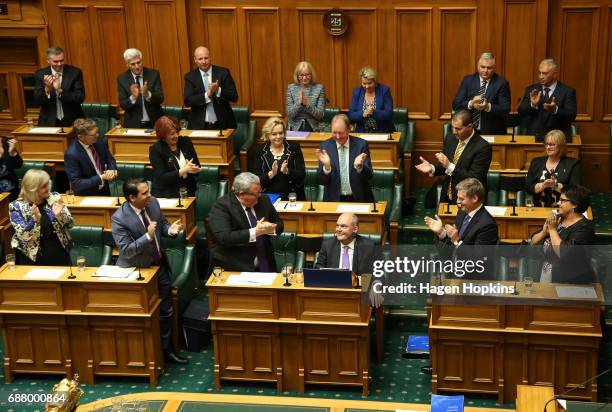 Finance Minister Steven Joyce is applauded by fellow MPs during the 2017 budget presentation at Parliament on May 25, 2017 in Wellington, New...