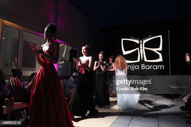 Models walk the runway at Sonjja Baram For Tzohar - Fashion Against Autism on May 24, 2017 in New York City.