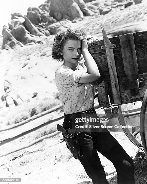 American actress Anne Baxter as Mike in a publicity still for the film 'Yellow Sky', 1948.